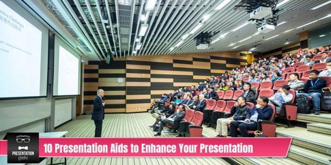 Man presenting with the caption "10 presentation aids to enhance your presentation"
